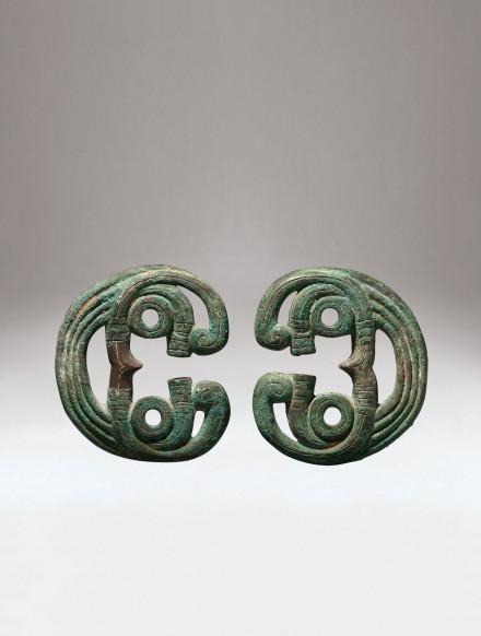 A PAIR OF ARCHAIC BRONZE HORSE BRIDLE ORNAMENTS / J.J. Lally & Co