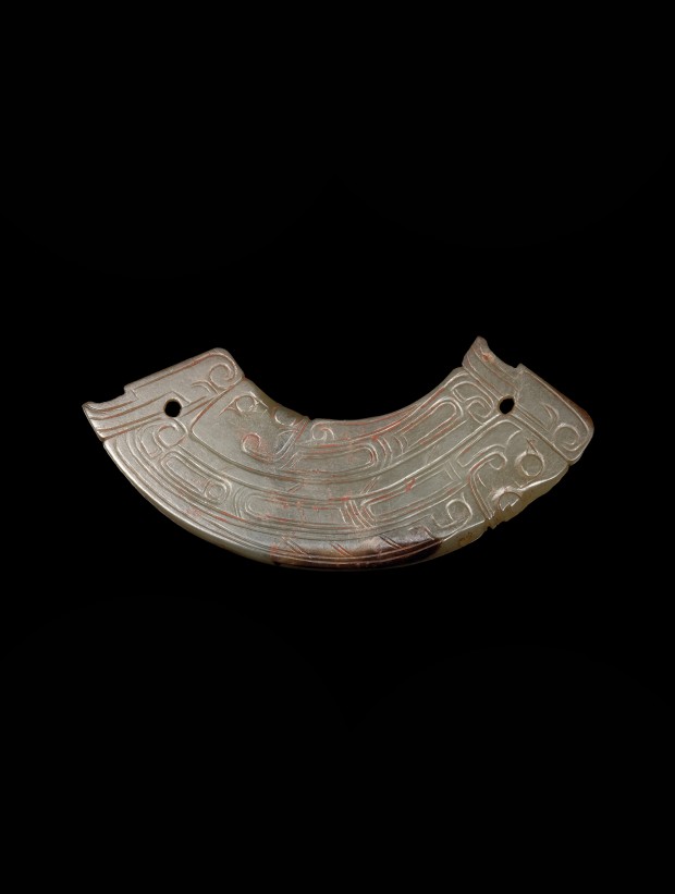 A PALE GRAY-GREEN JADE PENDANT (HUANG)