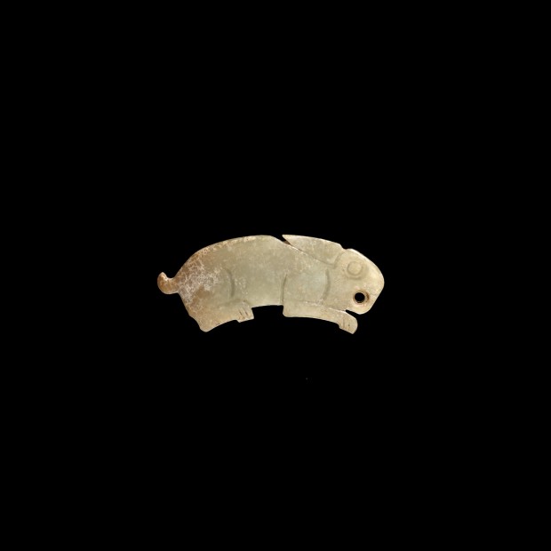 AN ARCHAIC JADE RABBIT PENDANT