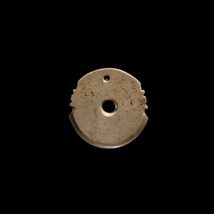 A SMALL ARCHAIC JADE AXE SHAPE PENDANT