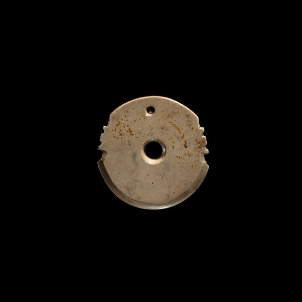 A SMALL ARCHAIC JADE AXE SHAPE PENDANT