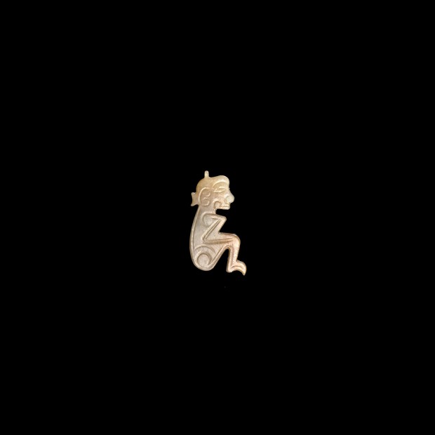 AN ARCHAIC JADE HUMAN FIGURE PENDANT